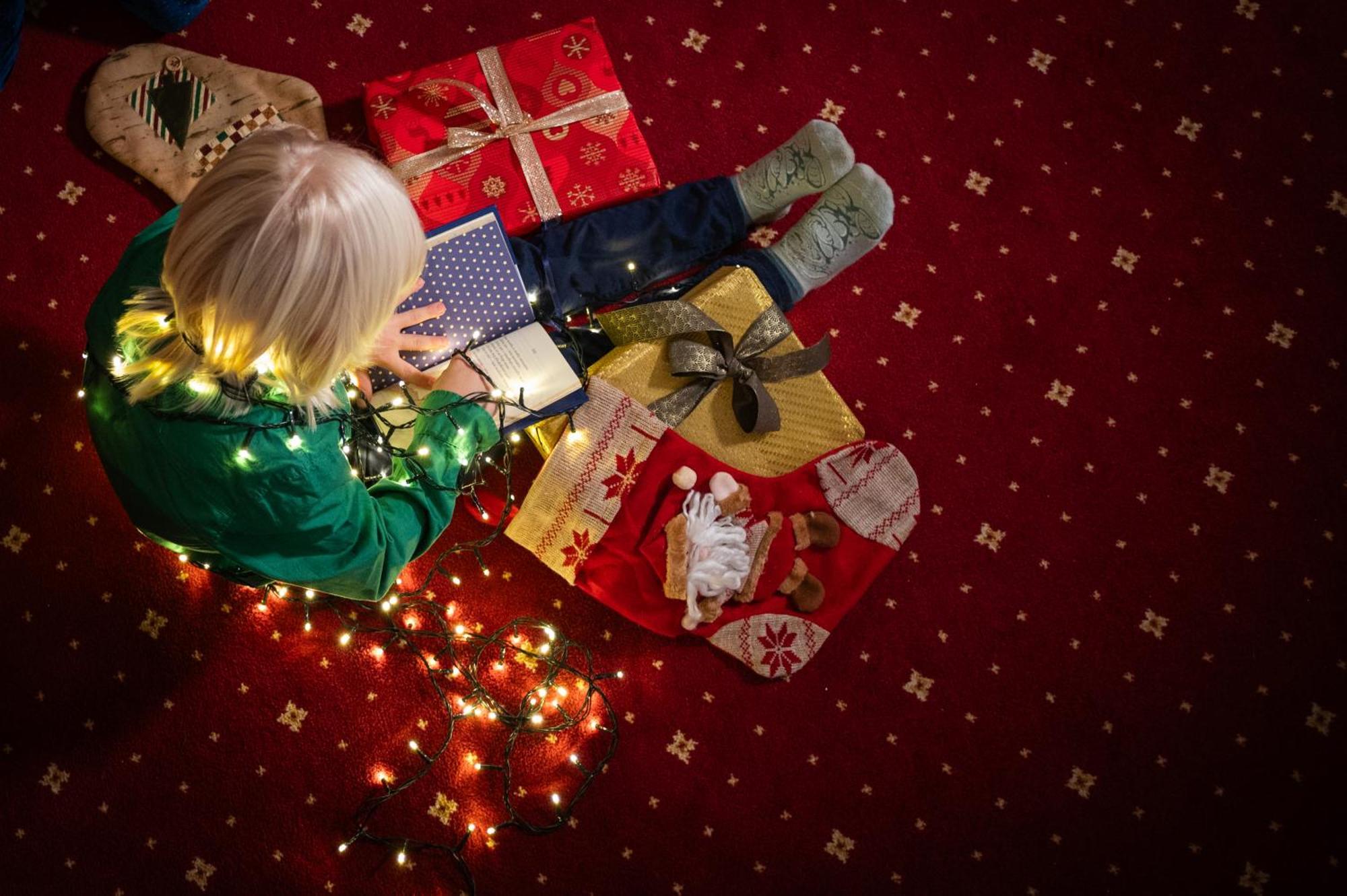 Grand Hotel Sofia Exterior photo A child opening Christmas presents